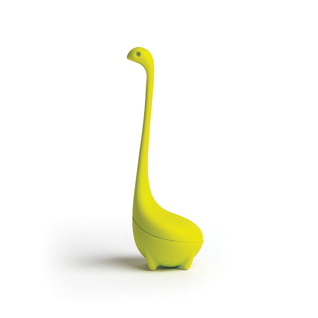 Introducing Baby Nessie, a green dinosaur-shaped tea infuser with a long neck and small legs by OTOTO.