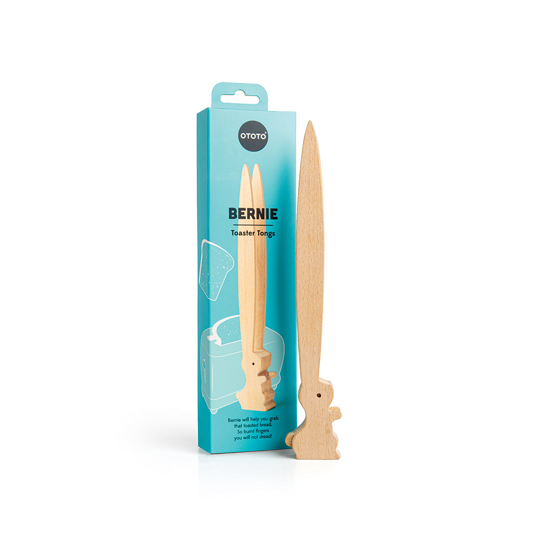 OTOTOs whimsical Bernie bunny-shaped wooden toaster tongs come in blue packaging.
