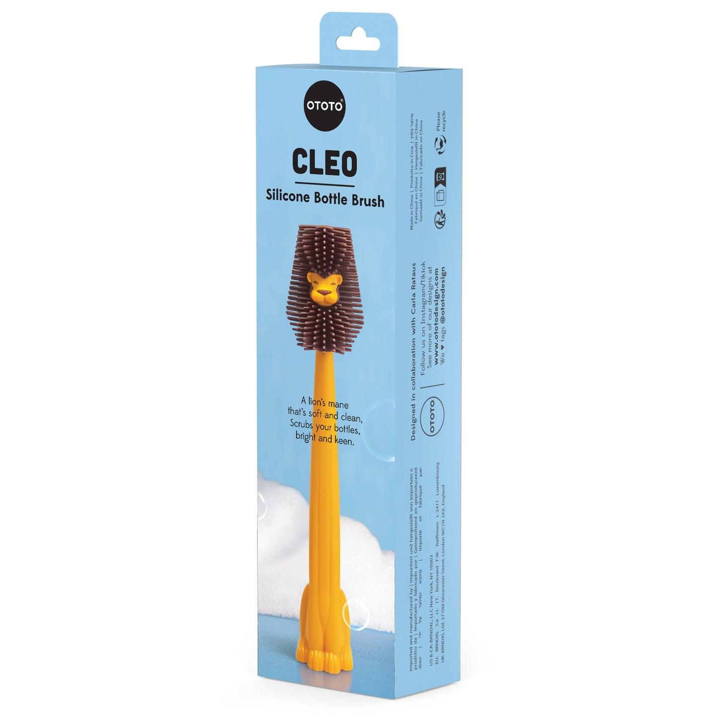 Cleo lion bottle cleaner in yellow silicone, shaped like a lion, comes in blue packaging.