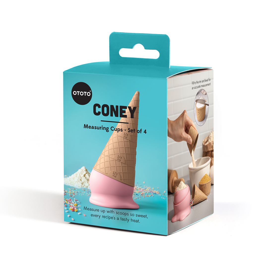 A box of OTOTO Coney measuring cups, ideal for pancake batter or baking cookies.