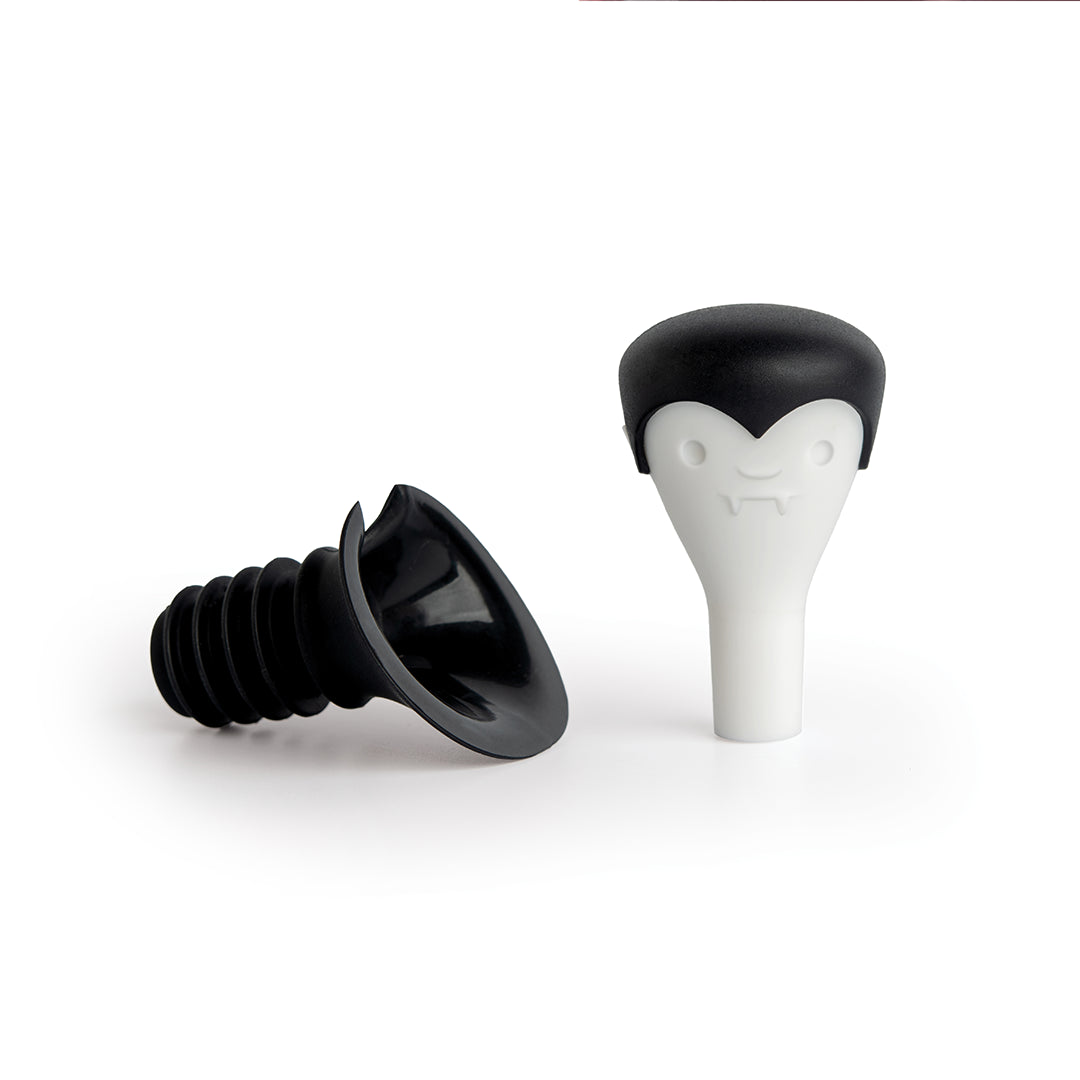 Count Corkula bottle stoppers have vampire fangs and black caps, perfect for wine enthusiasts.