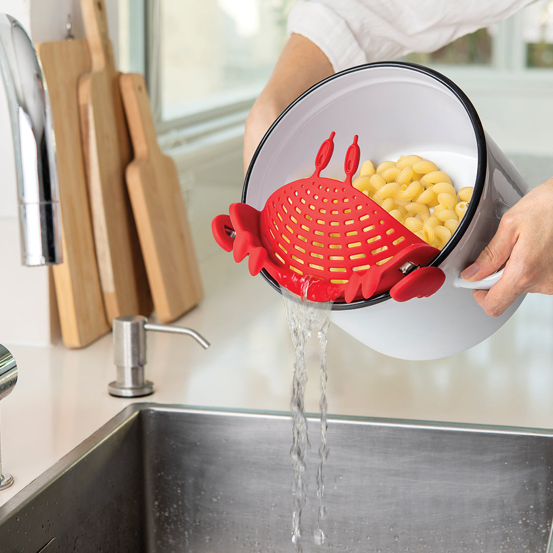 Crabby by OTOTO clips on pots for easy draining. Its a fun strainer and quirky kitchen accessory!.