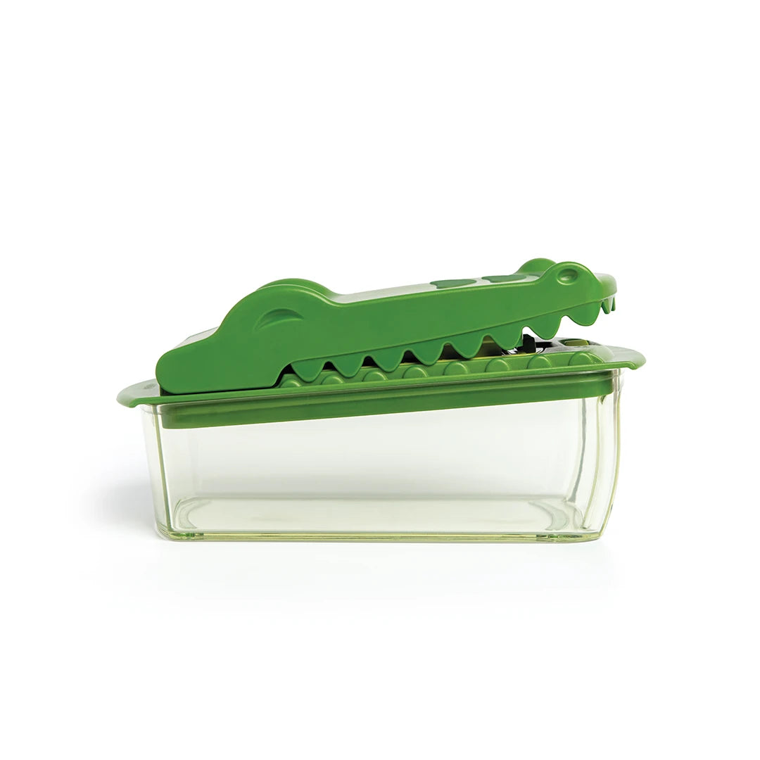Croc Chop clear container with lid, side view.