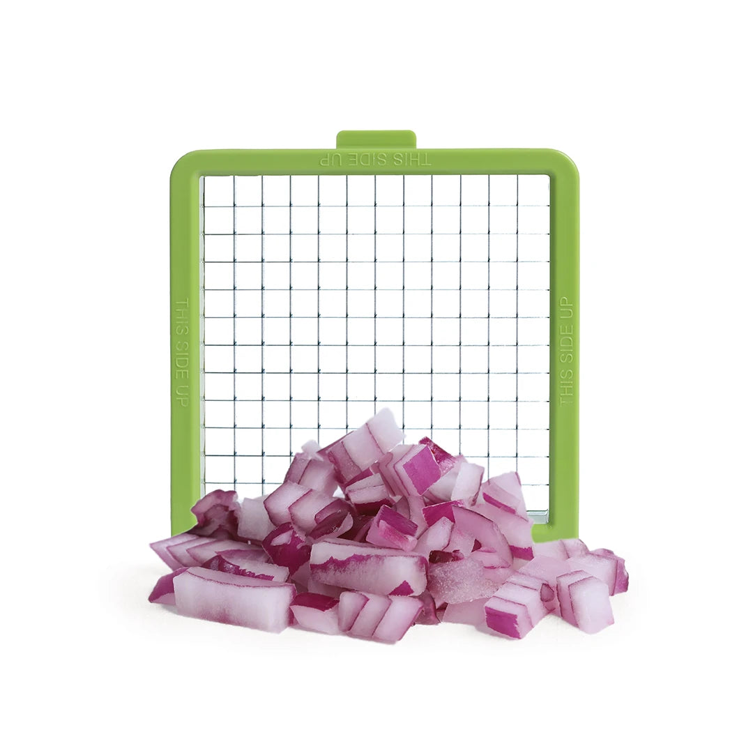 Diced red onion next to a Croc Chop with a green grid slicer.