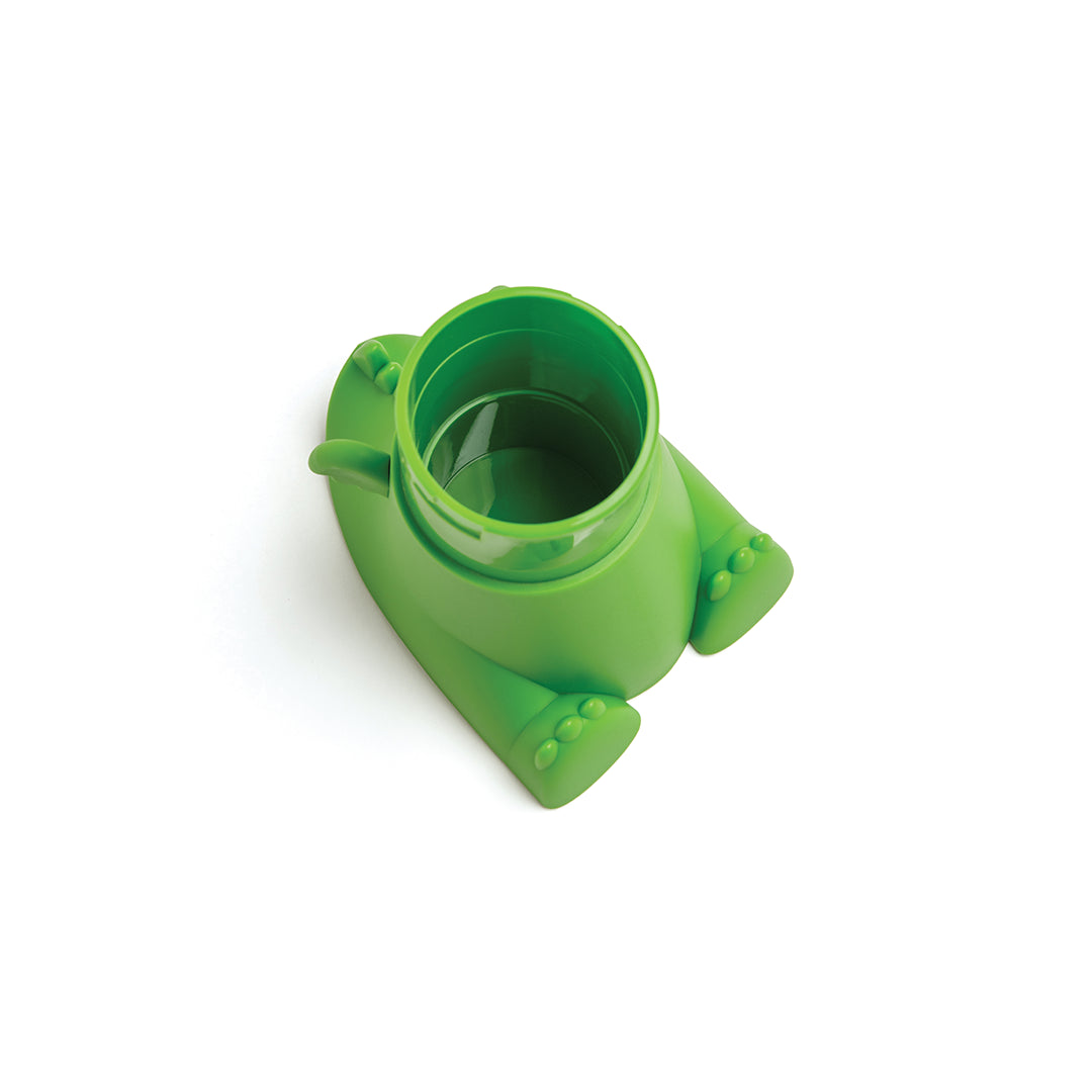 Charming OTOTO Dracowave, green frog-shaped watering can on a white background, viewed from above.