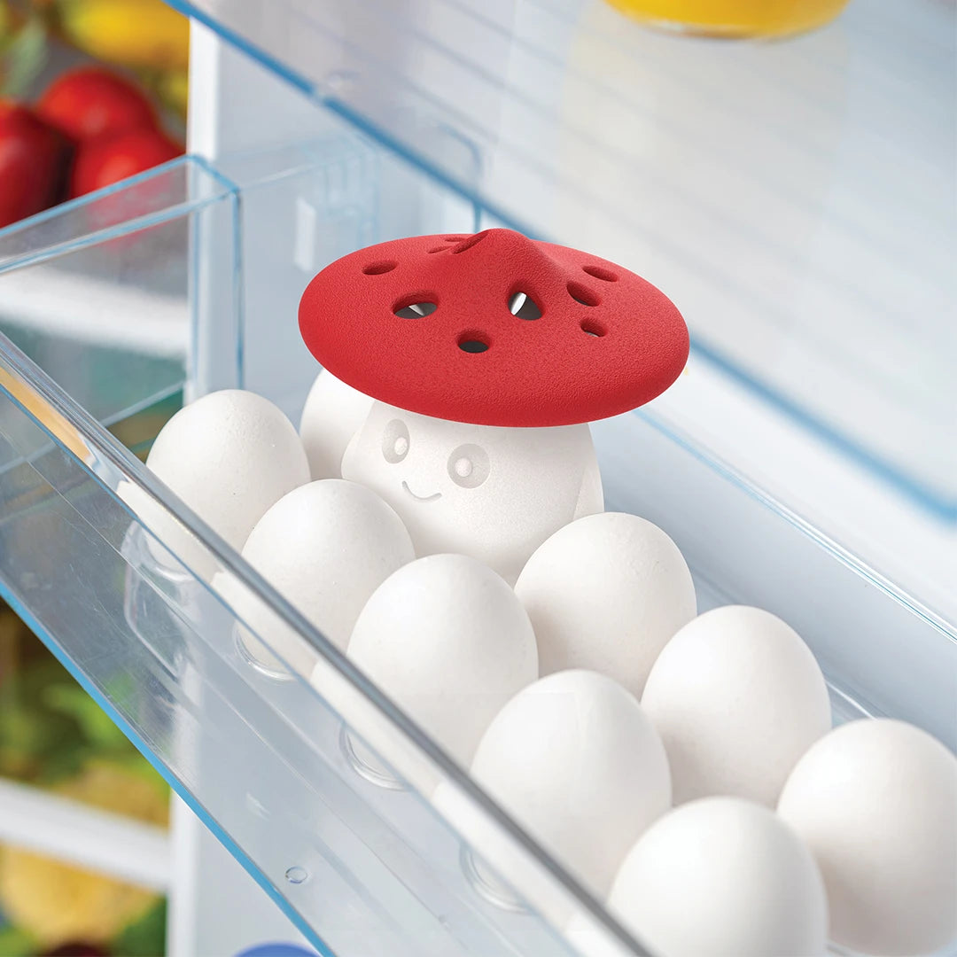 OTOTOs Fun Guy holder, with a fun red mushroom cap, keeps eggs fresh in your fridge.