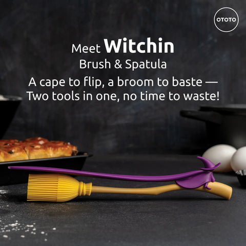 The Witchin broomstick basting brush and spatula set rests on a counter with baked goods.