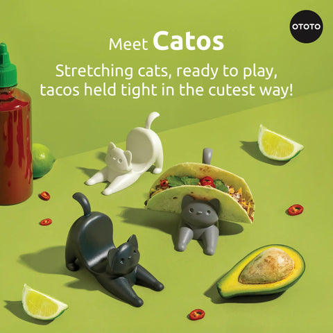 Three OTOTO Catos cat taco holders with food on green, plus playful text introducing Catos.