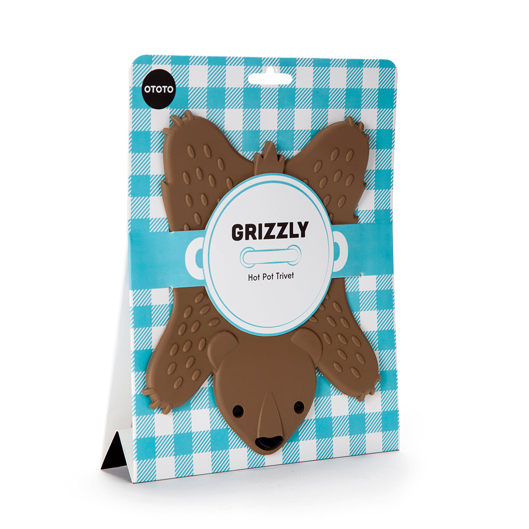 Grizzly hot pot trivet by Lilach Eytan in blue checkered packaging.