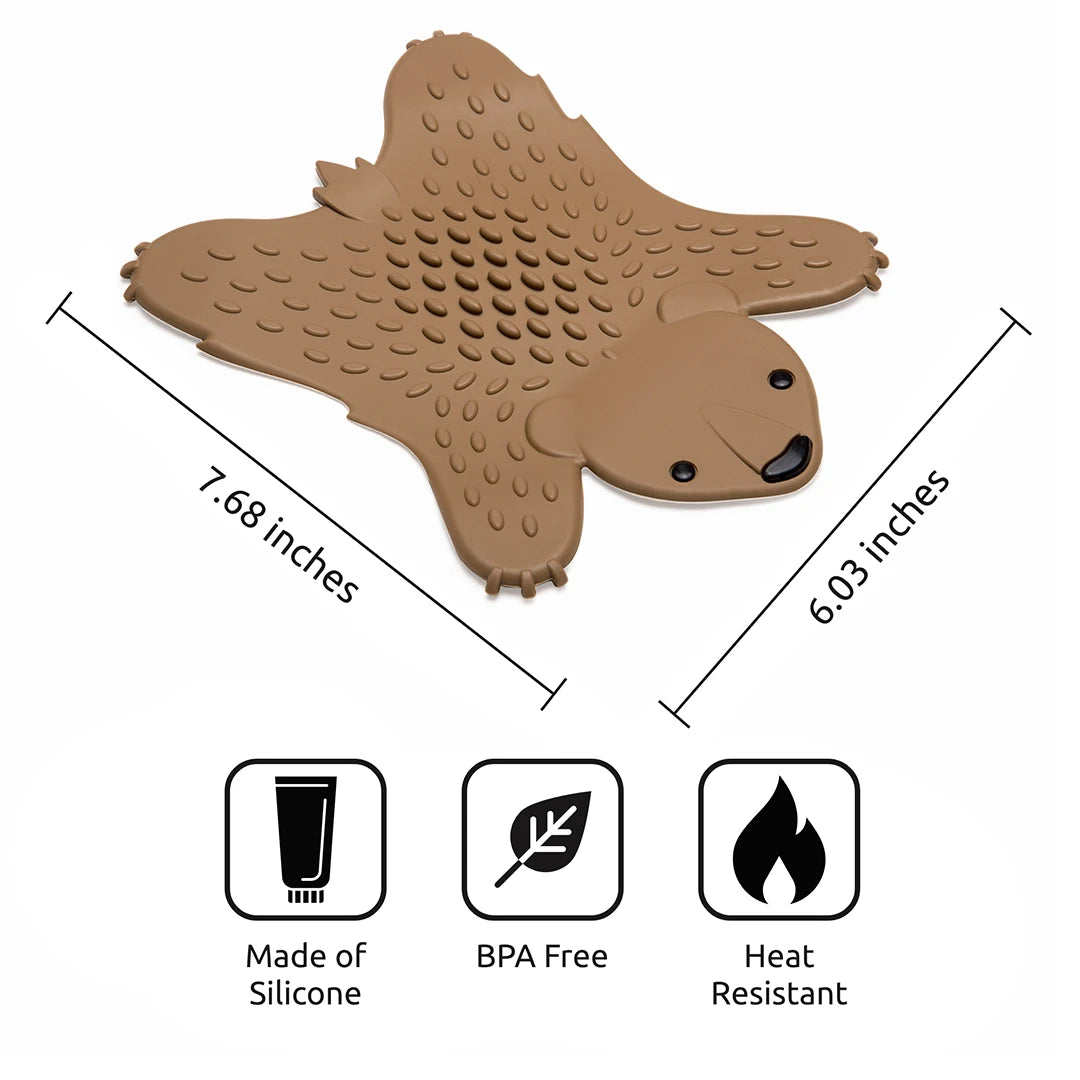 Grizzly bear-shaped silicone trivet, BPA-free, with material and heat resistance icons.