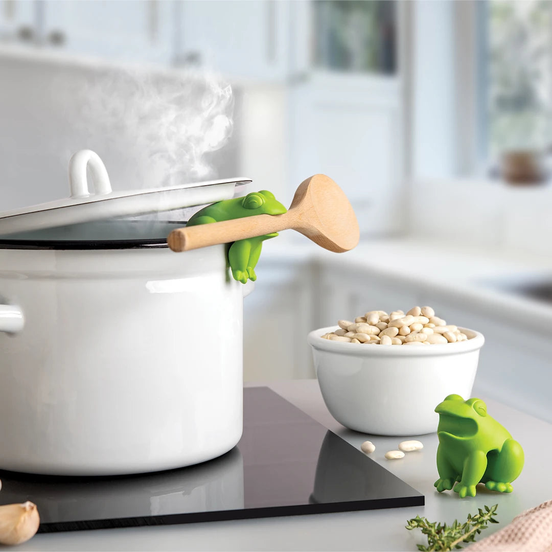 HopTop by OTOTO on a steaming pot, white beans nearby in a modern kitchen.