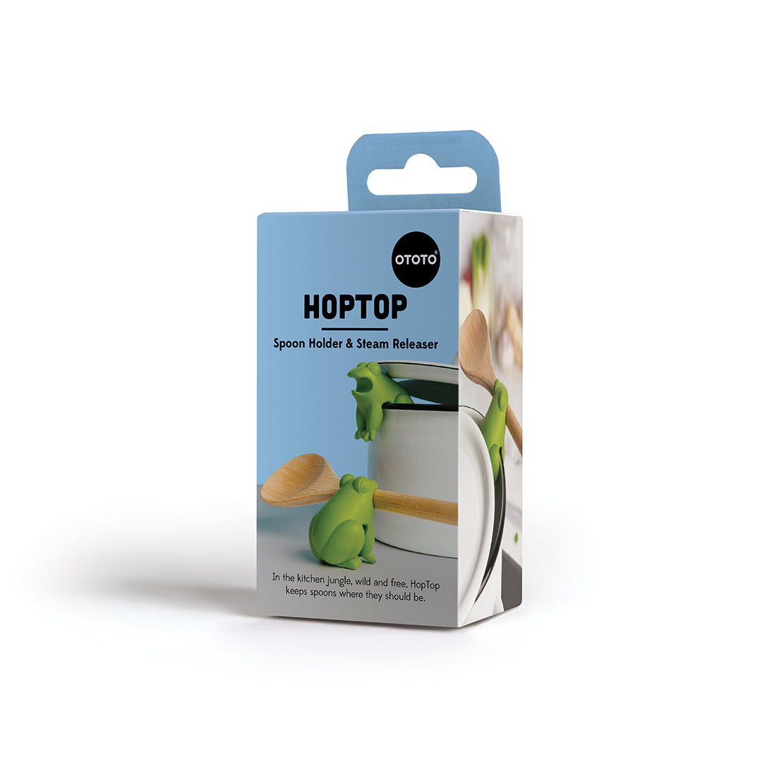 Box of HopTop froggy spoon rest & steam releaser with a playful frog design for your stovetop.