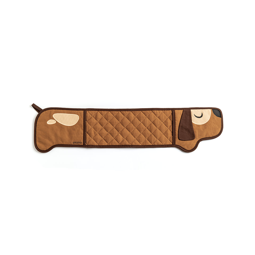 Quilted brown dog-shaped Hot-dog Mitts draft stopper by OTOTO on a white background.