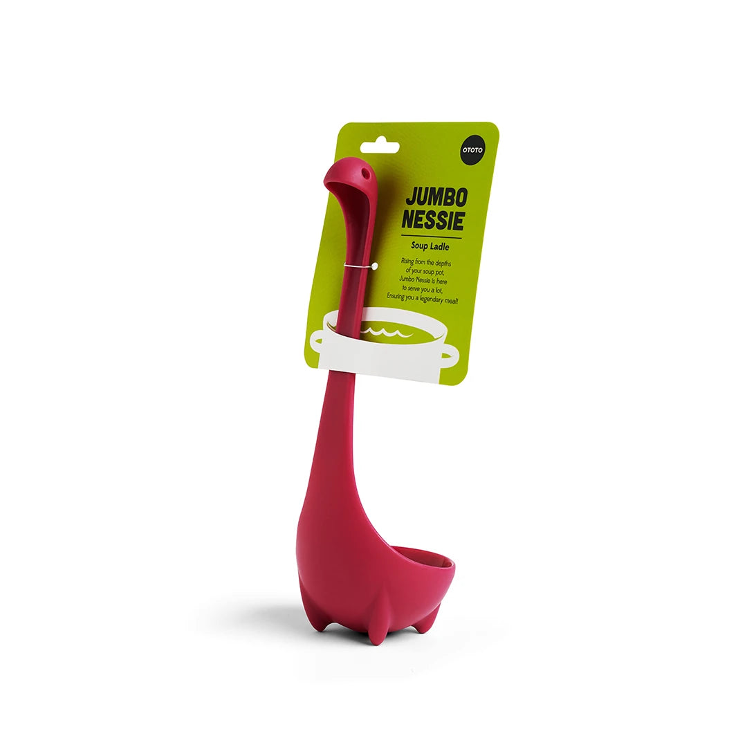 OTOTOs Jumbo Nessie (Purple) dinosaur-shaped soup ladle can stand on its own with packaging attached.