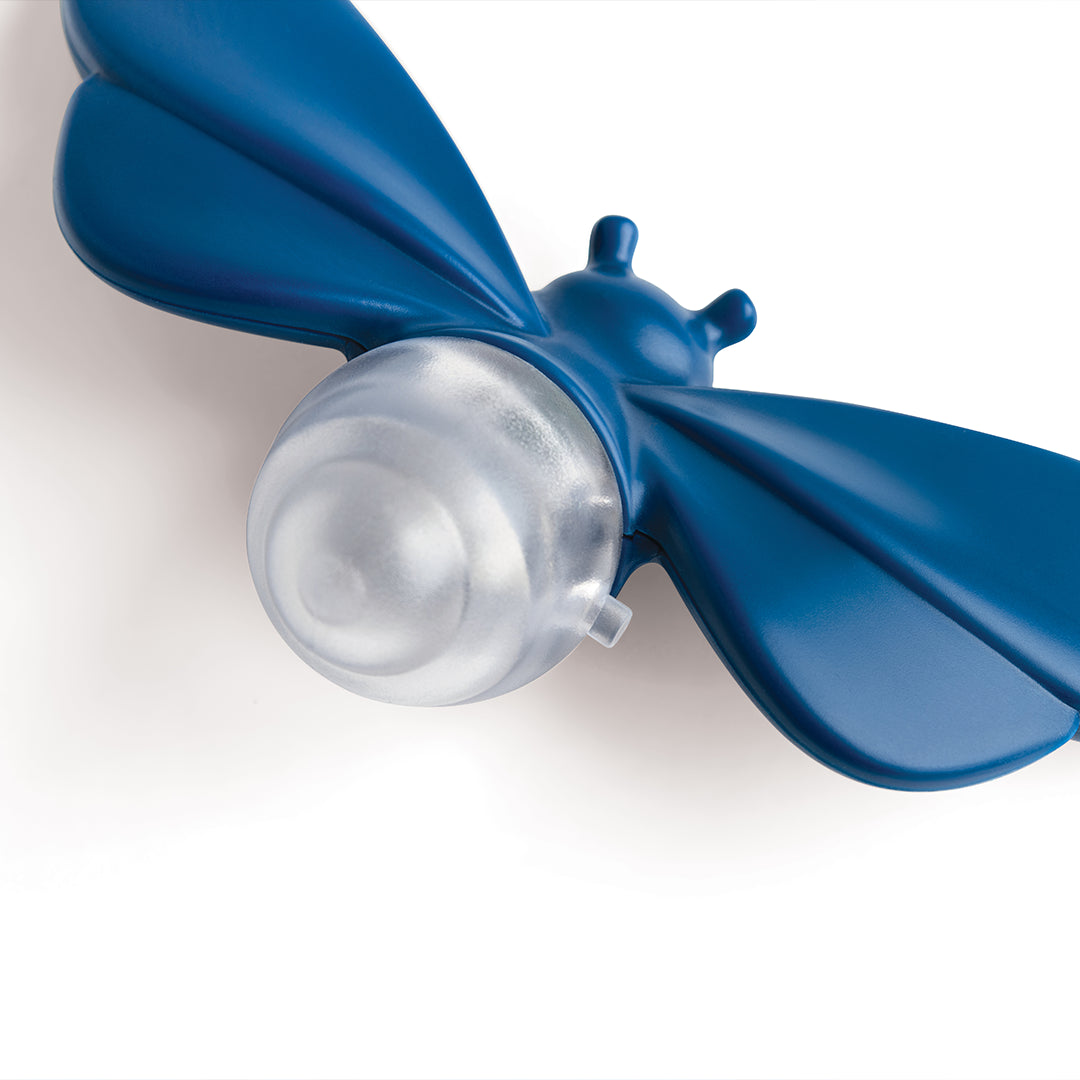 OTOTO Lightbug lamp: Blue, insect-shaped, plastic with a clear bulb on a white background.