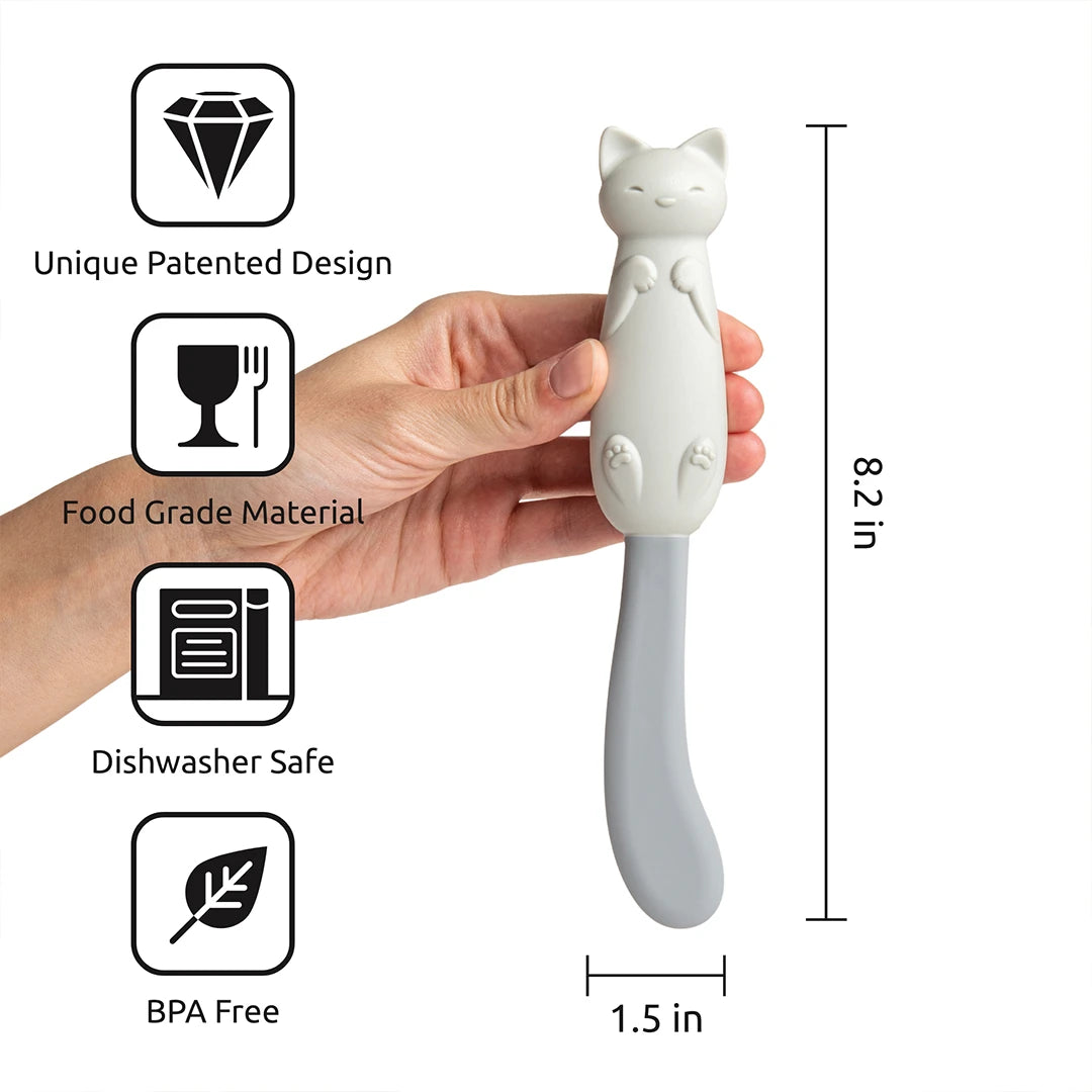 Hand holding a Mary Cat silicone spatula: food-safe, dishwasher-safe, BPA-free, 8.2 length.
