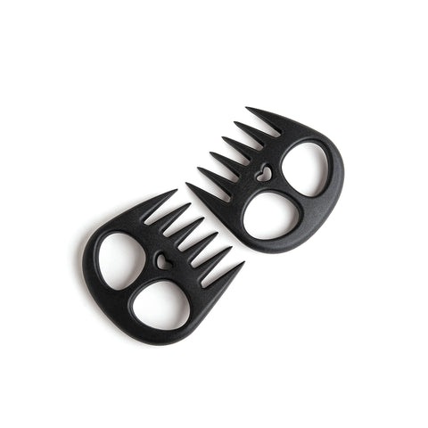 Two Meat Muncher claws, black with heart cutouts, on a white background.