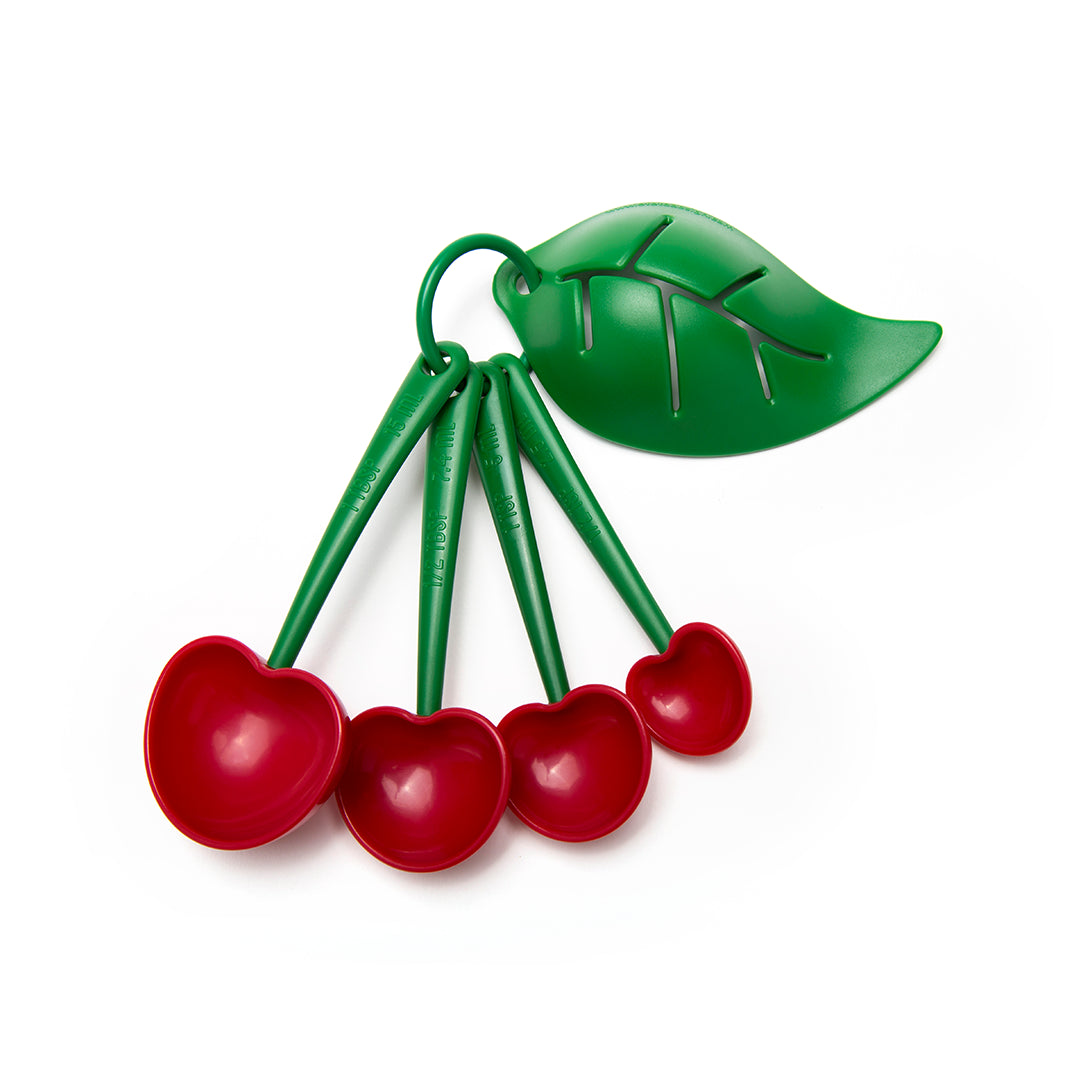 Mon Cherry measuring spoons with a green leaf handle, ideal for any cooking or baking project.