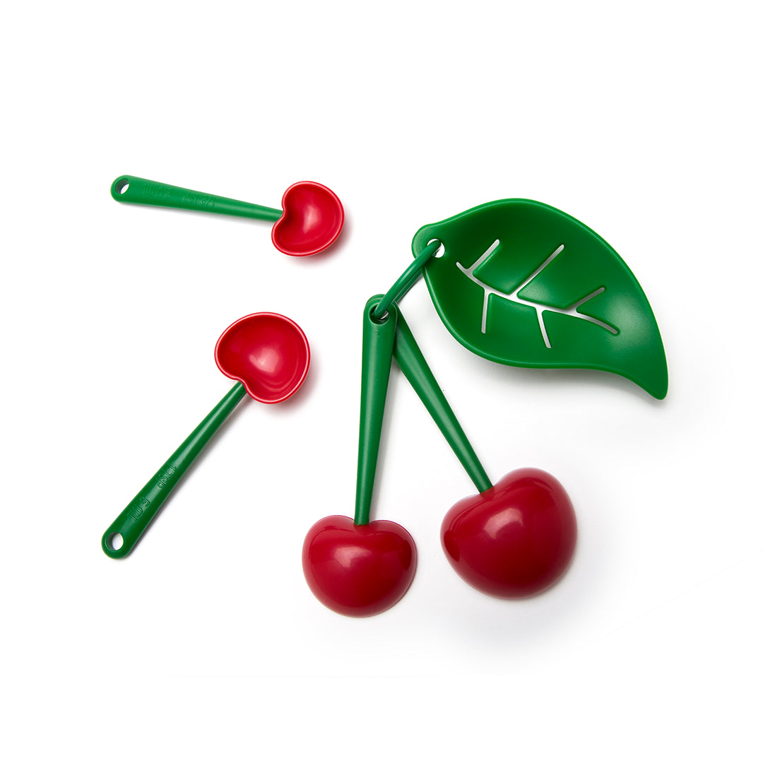 Mon Cherry measuring spoons with a green leaf design are perfect for cooking and baking!.