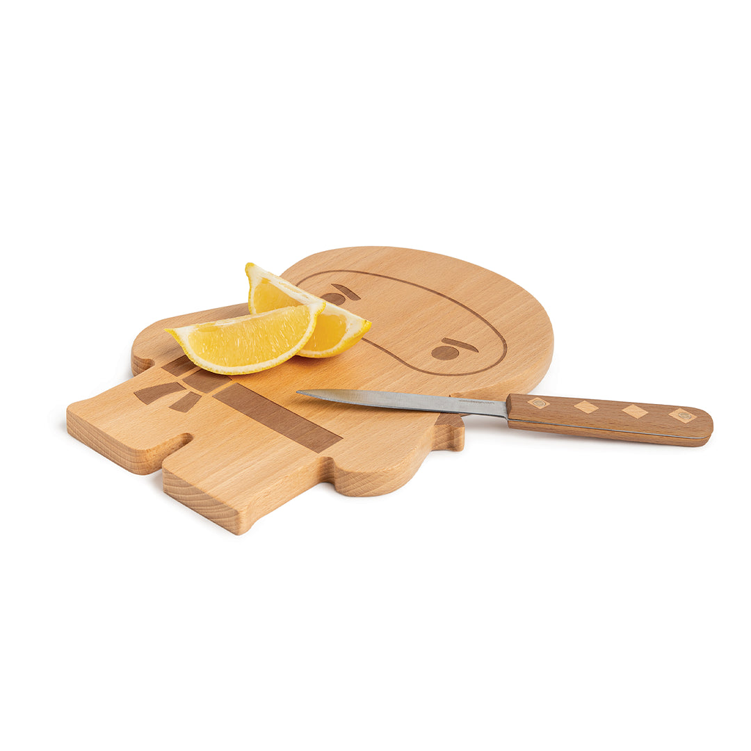 OTOTO Ninja Board with lemon slices and a knife from the set on top.