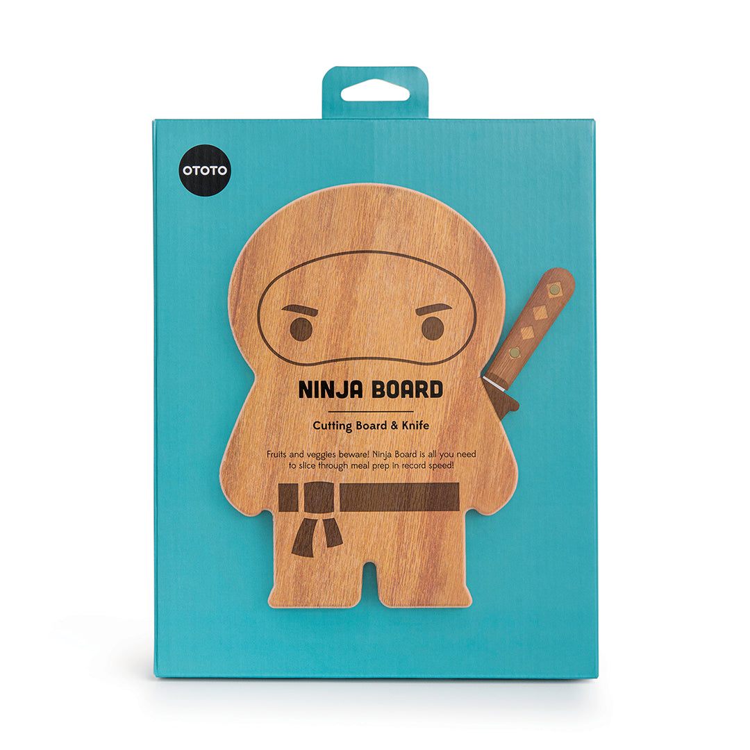 Ninja Board: A cutting board by OTOTO with a ninja shape and a printed knife design on the side.