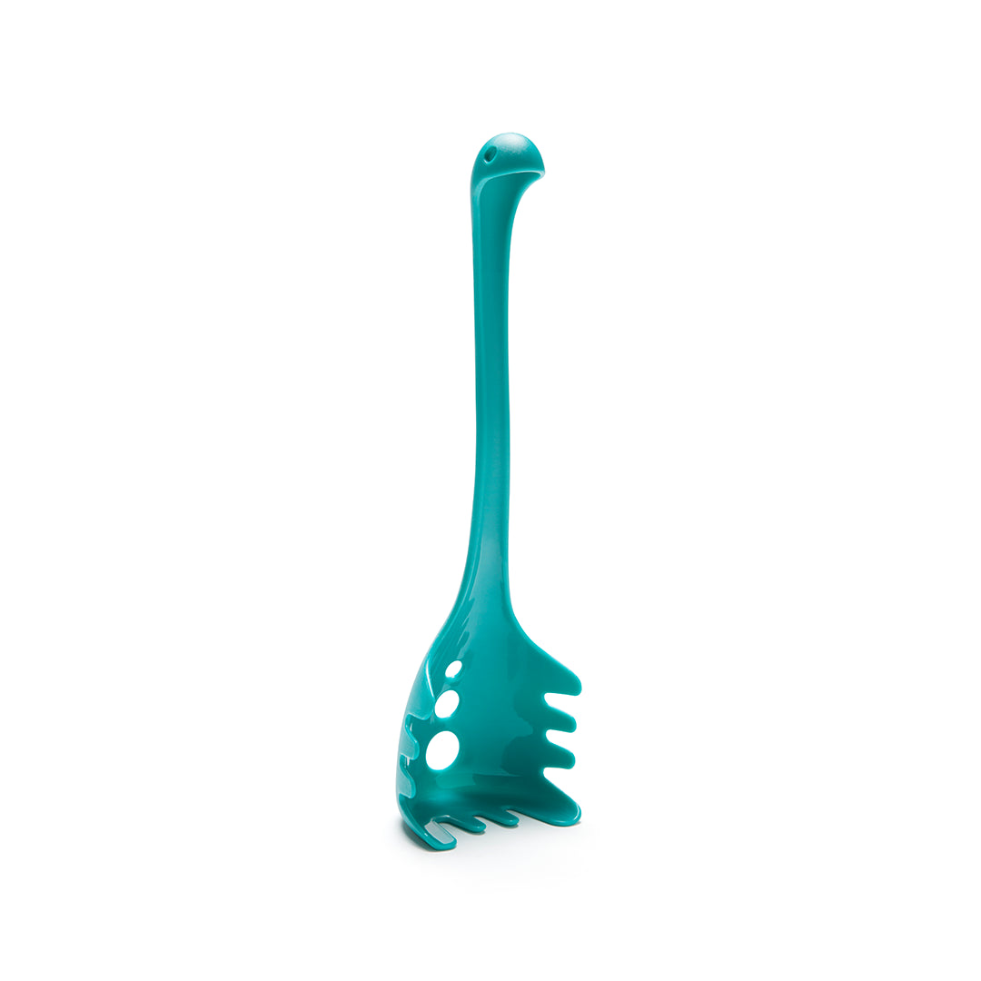Papa Nessie by OTOTO: a teal dinosaur pasta spoon with a long neck and serrated edges.