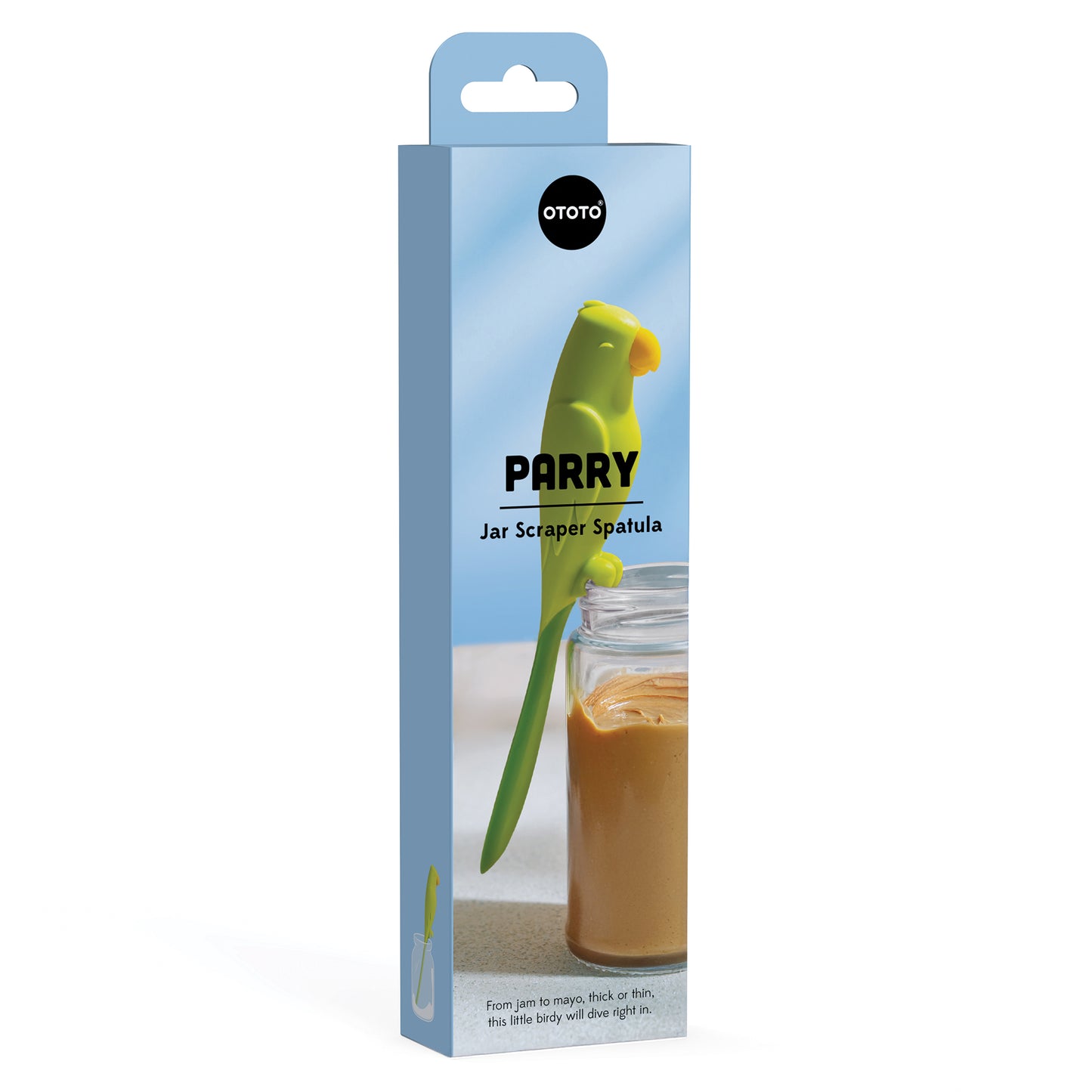 A green Parry parrot-shaped jar scraper spatula by OTOTO rests on a peanut butter jar.