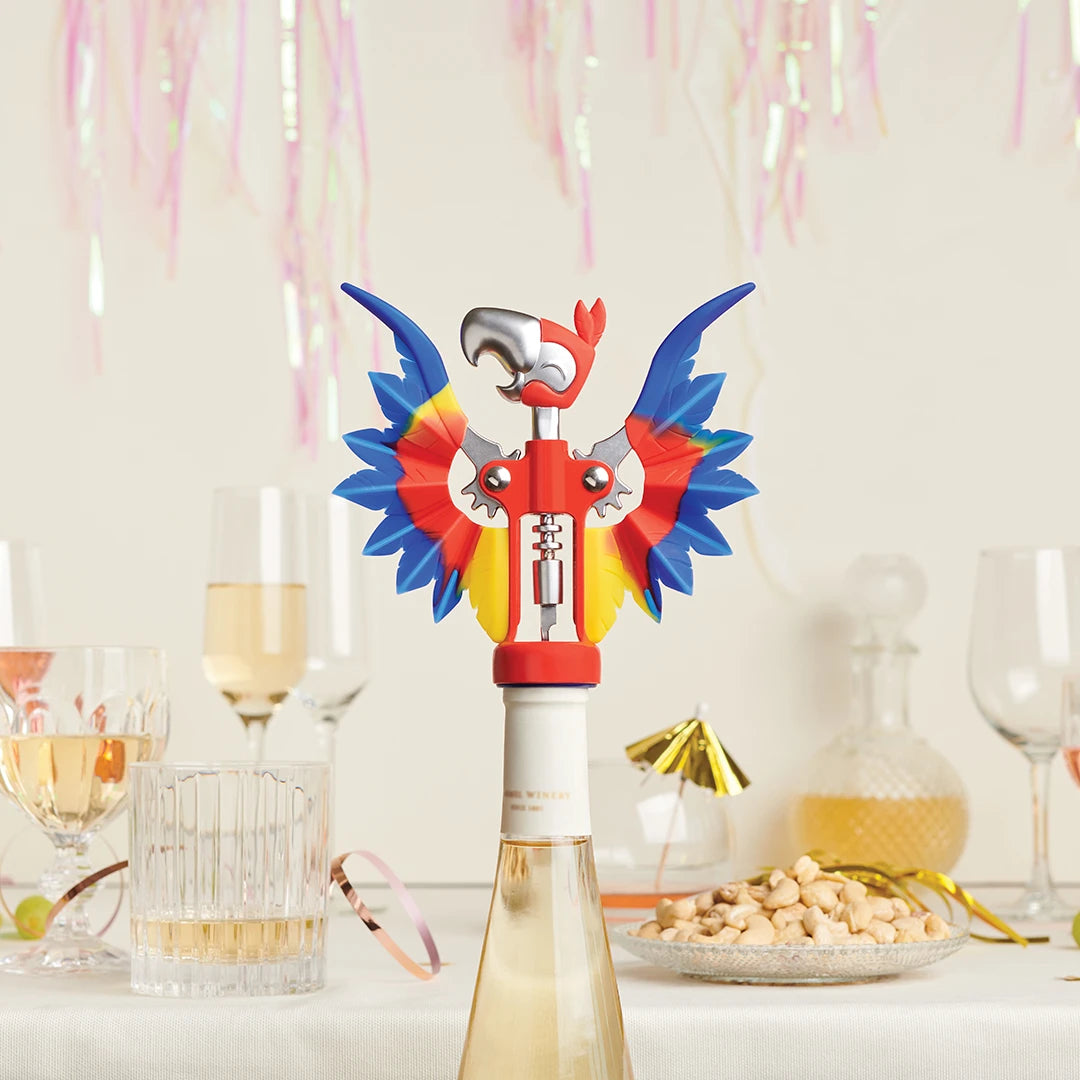 OTOTOs vibrant Pinot corkscrew is the perfect party wingman among festive glasses and decorations.