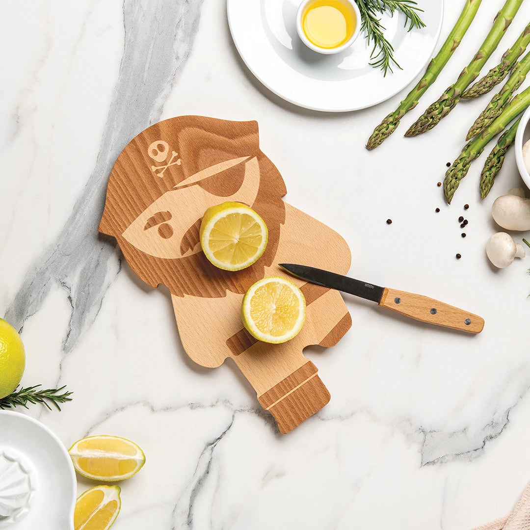 OTOTO Pirate Board with lemon, knife, and ingredients on marble.