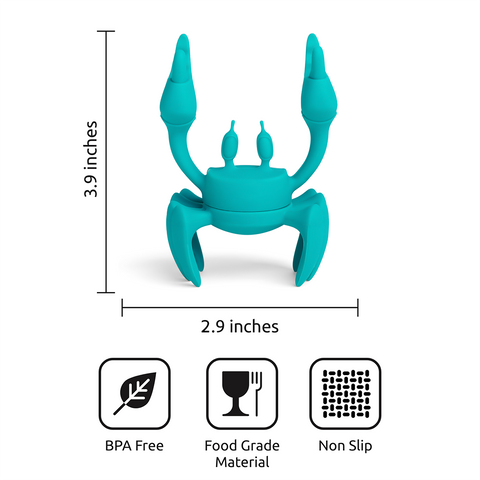 Aqua OTOTO crab-shaped utensil holder, BPA-free, food-grade silicone rest; non-slip design.