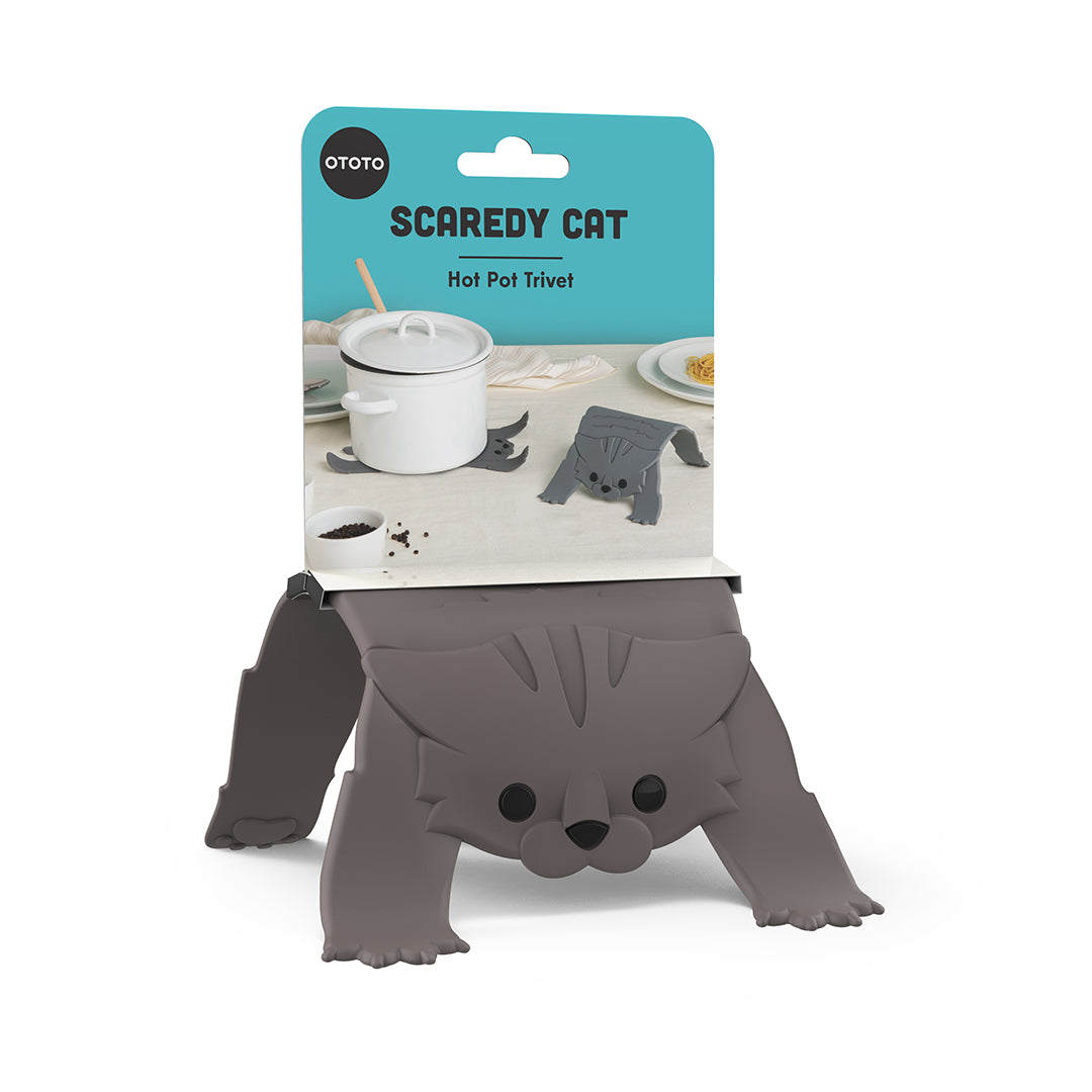 OTOTOs Scaredy Cat trivet features a gray cat shape and a white pot on its packaging.