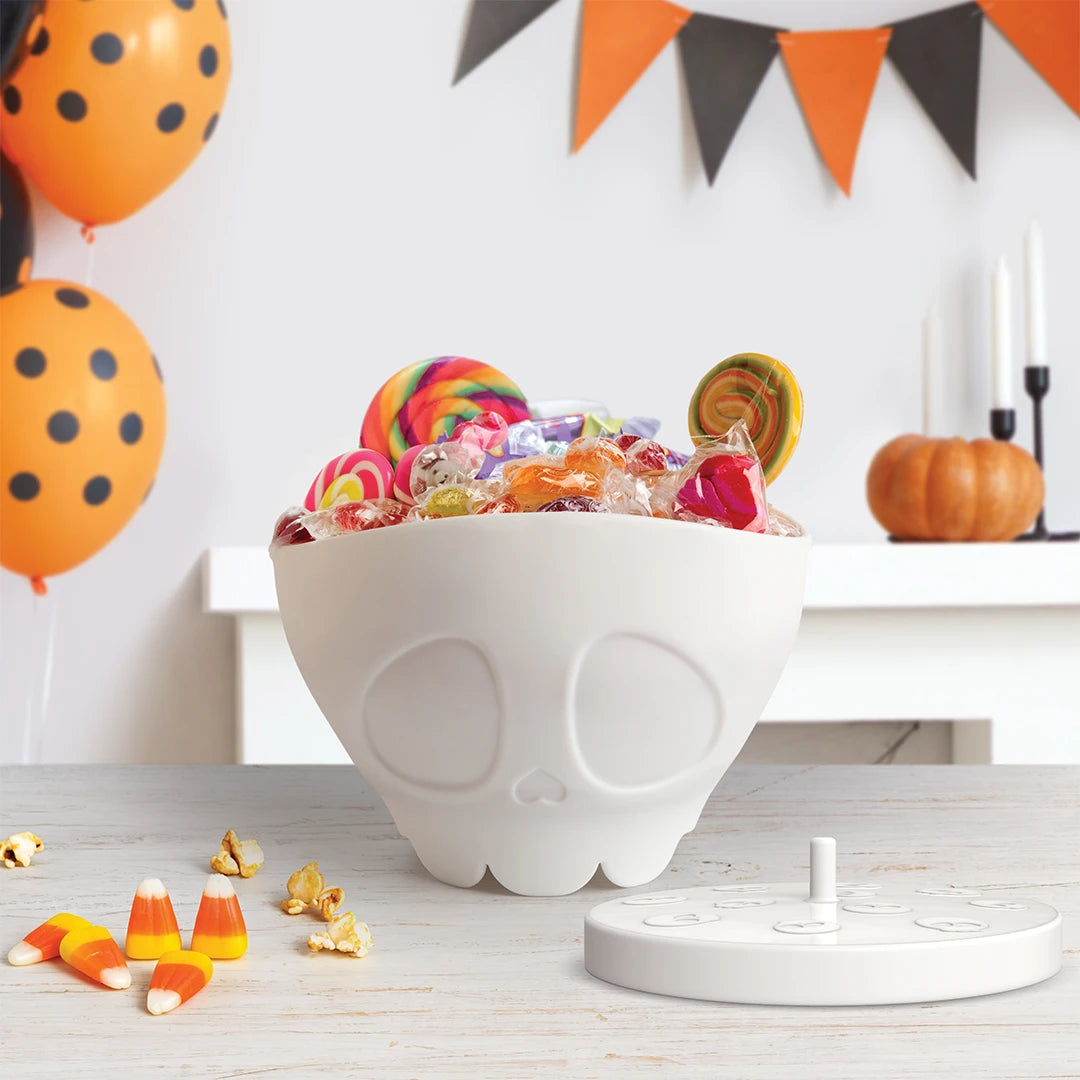 Scary Poppings candy bowl with assorted treats, ideal for a spooky adventure setting.