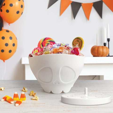 Scary Poppings candy bowl with assorted treats, ideal for a spooky adventure setting.