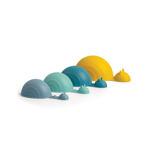 Shelly OTOTO snail-shaped measuring spoons in blue, teal, and yellow, lined up by increasing size.