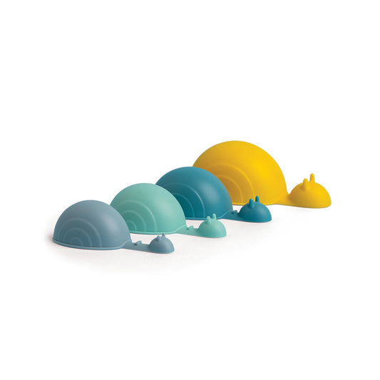 Shelly OTOTO snail-shaped measuring spoons in blue, teal, and yellow, lined up by increasing size.