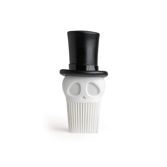 Skully: A comb in white skull design with a black top hat, ideal for baking adventures.