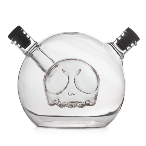 Skully oil & vinegar dispenser: clear glass, dual necks, skull design on white background.