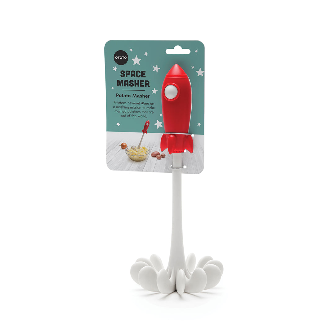 OTOTOs red rocket Space Masher mashes potatoes into a small bowl easily.