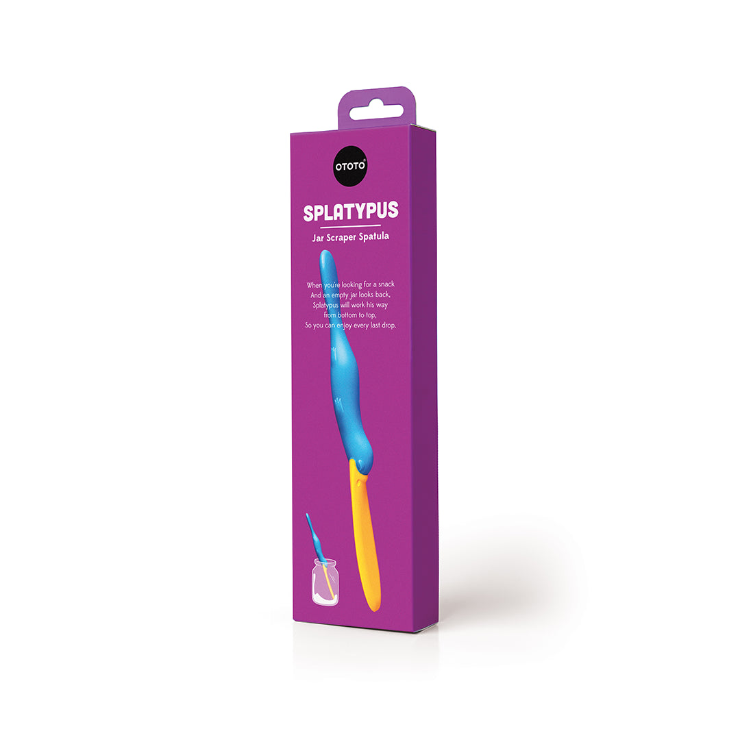 Purple box showcasing an OTOTO Splatypus, a vibrant jar scraper spatula in blue and yellow.