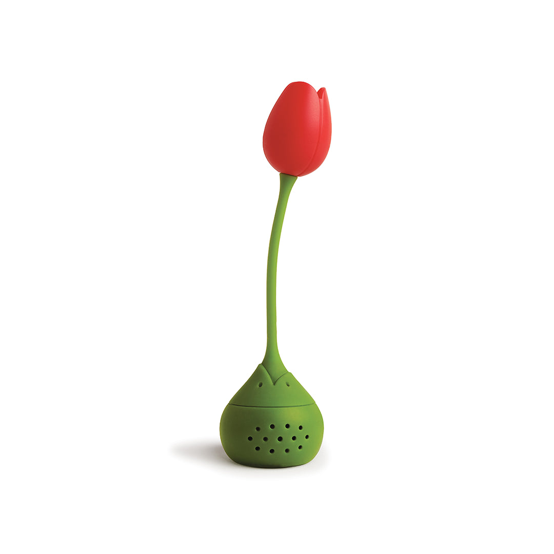 The Tulip tea infuser, red with a green stem and base, sits elegantly against a white background.