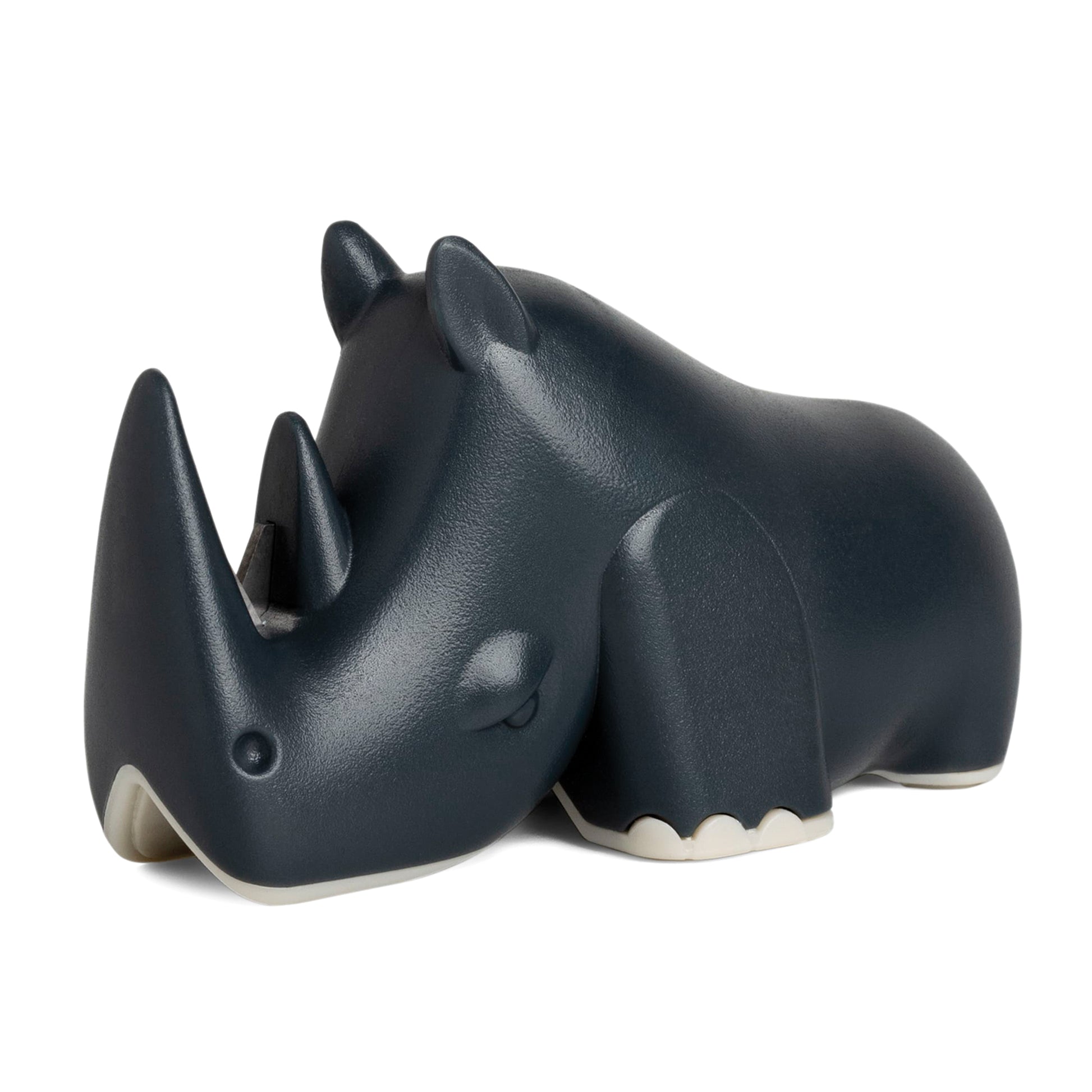 Blade is a dark grey, stylized OTOTO rhino sculpture that also serves as a kitchen knife sharpener.