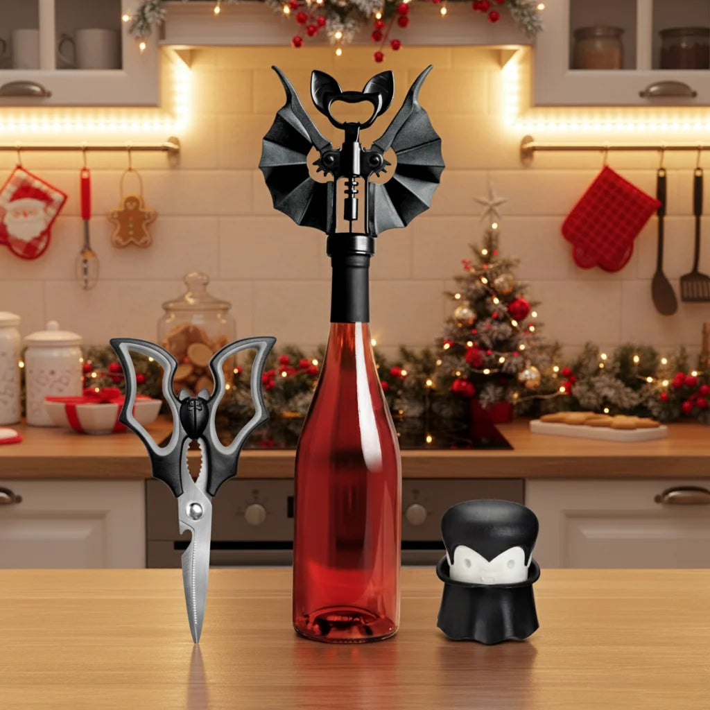 A festive kitchen with OTOTO’s Boo-tiful Crew bat corkscrew, scissors, and penguin bottle cap on wine.