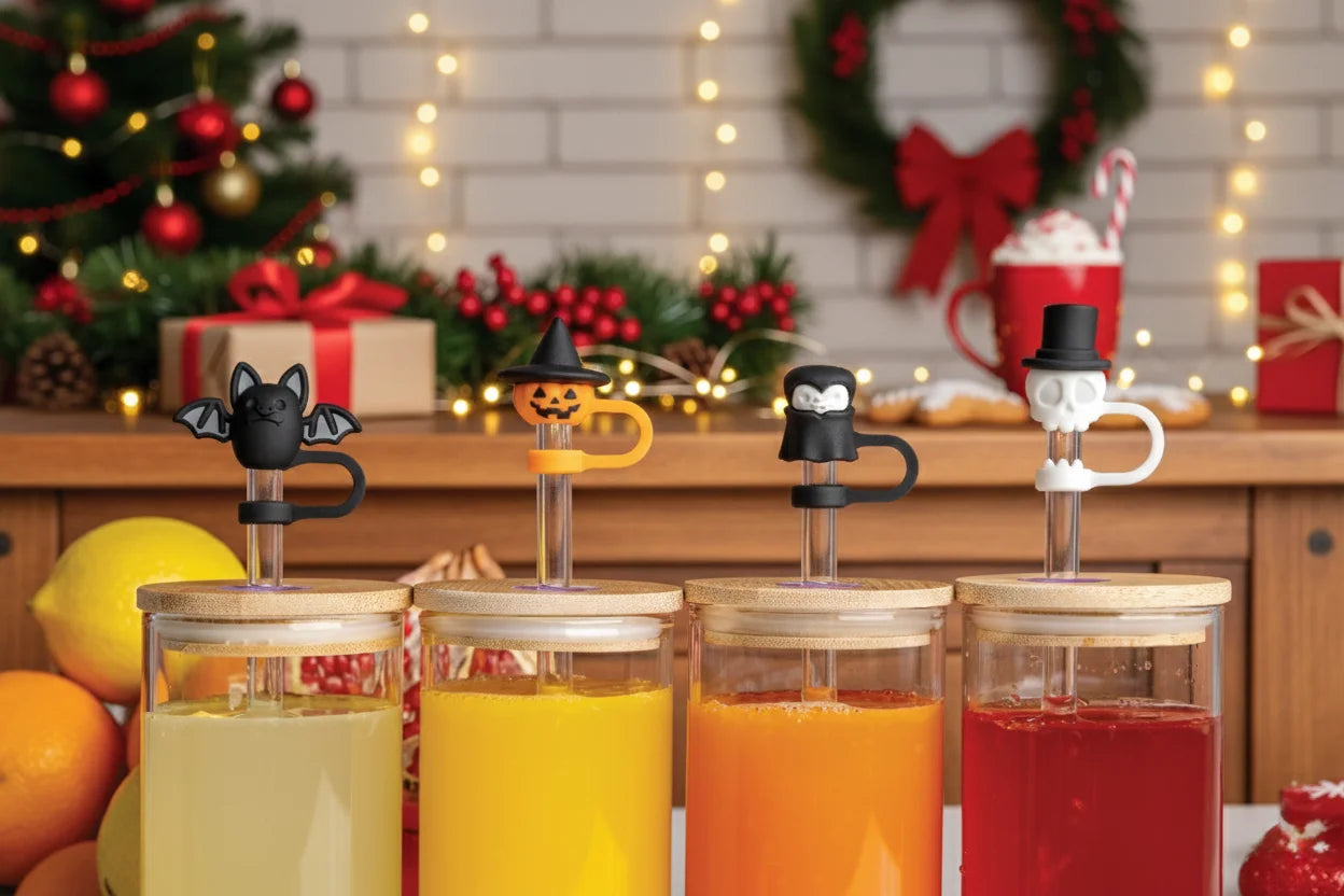 Four Boo Team festive drink straw toppers by OTOTO, set amid Christmas-themed decor.