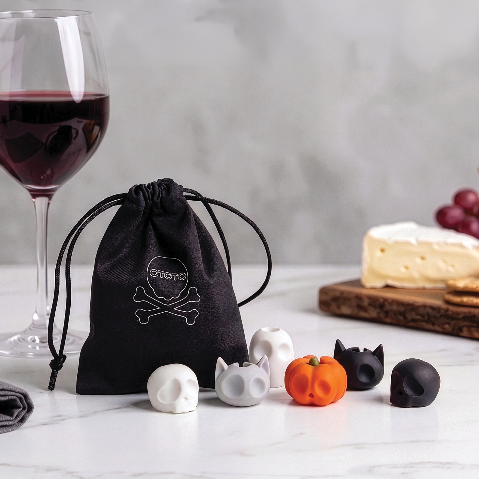 The Boo Team set features six small Halloween-themed figurines in front of a black bag.
