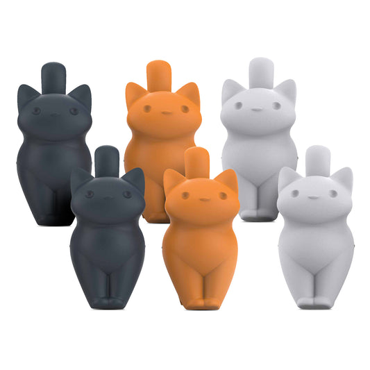 Six CatSnap bottle stoppers in black, orange, and white stand in two rows.