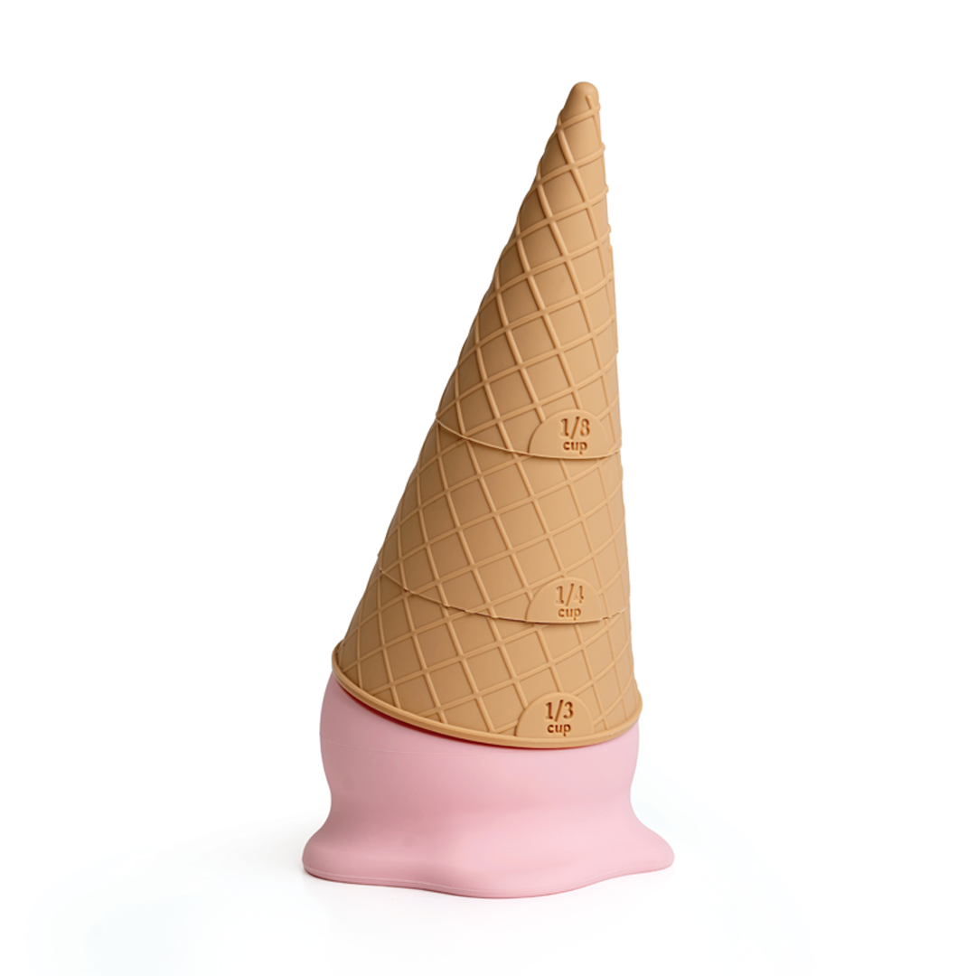A stack of Coney waffle cones on pink ice cream, each marked like an ice cream measuring cup.