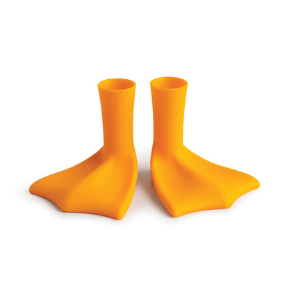 A pair of Duck-Clean bright orange, duck-foot-shaped swim fins by OTOTO on a white background.