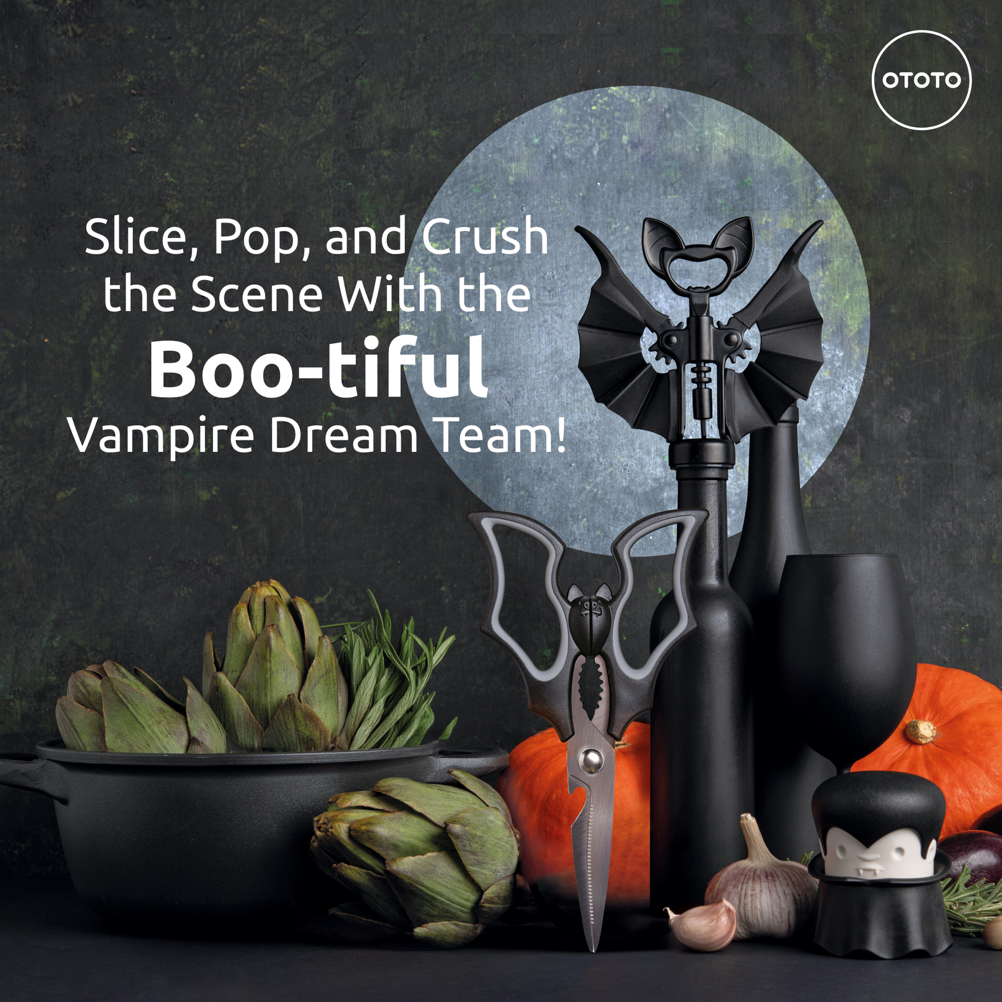 Boo-tiful Crew Halloween kitchen tools with Elizabat designs, perfect amid artichokes and pumpkins.
