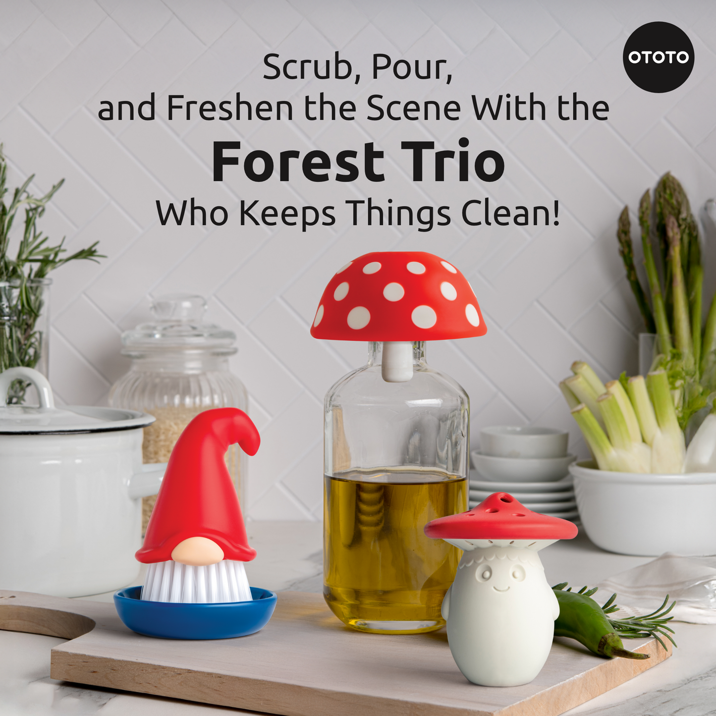 Forest Trio gnome kitchen tools and a dish brush rest on the counter with veggies and oil.