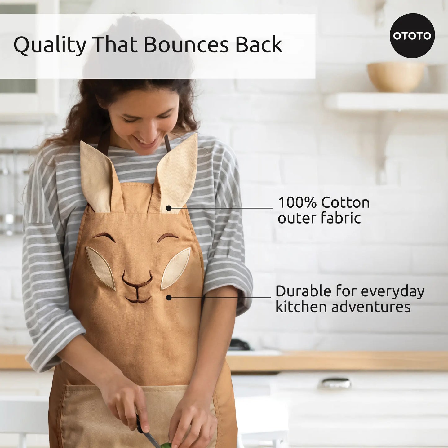 Smiling woman wears Aproo brown bunny kitchen apron; text highlights its quality and durability.